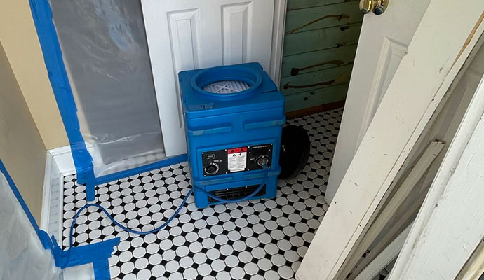 Air scrubber for water damage restoration