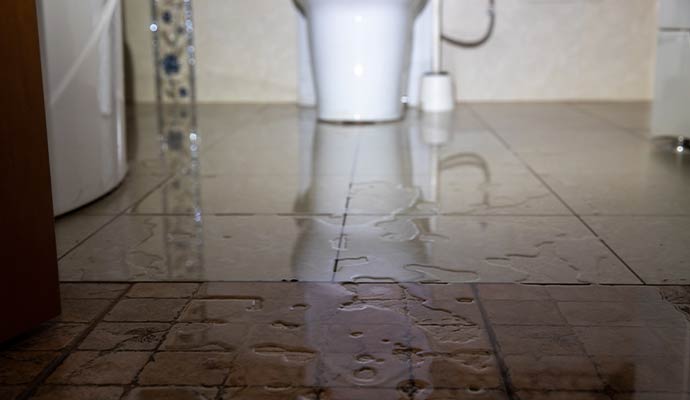 Bathroom floor water damage.