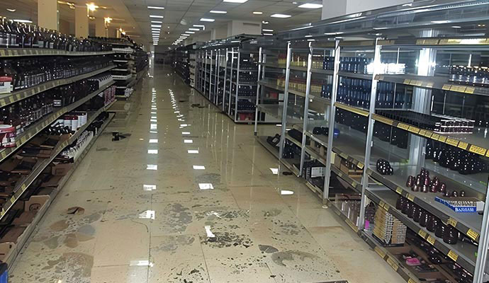 Water damaged floor in retail store