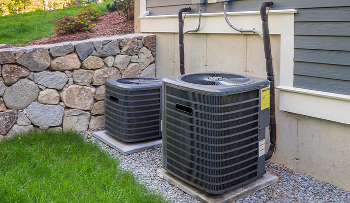 Dual outdoor HVAC condenser units