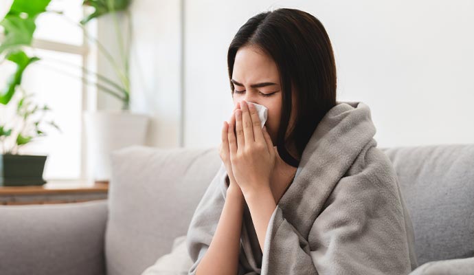 A person sneezing