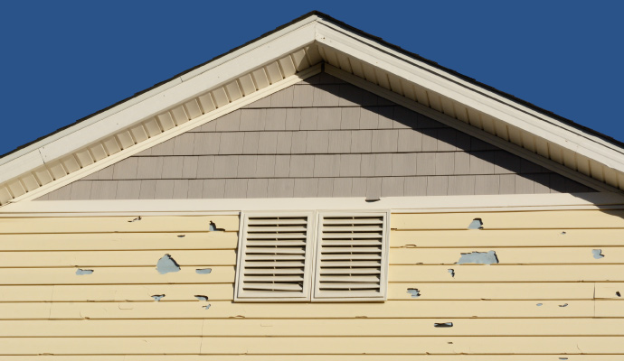 Hail damaged house