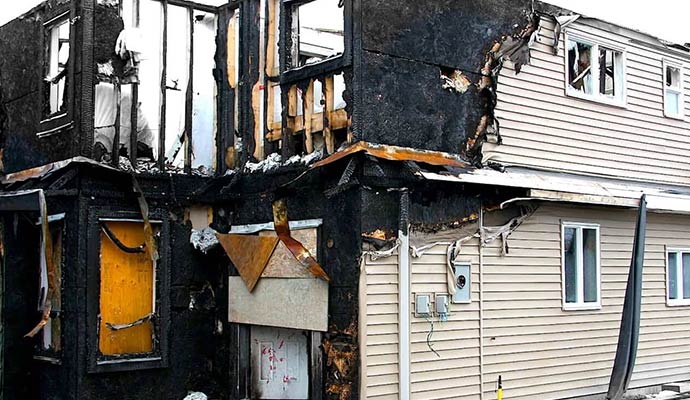 Residential fire damaged house.