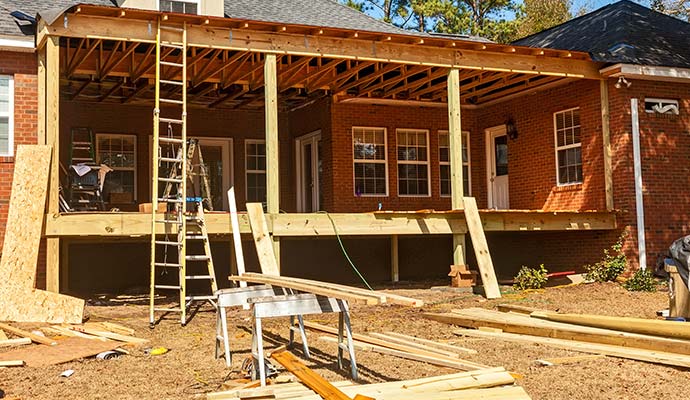 Residential framing and deck construction during structural reconstruction