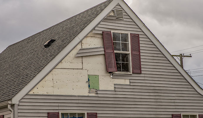 Damaged exterior house walls