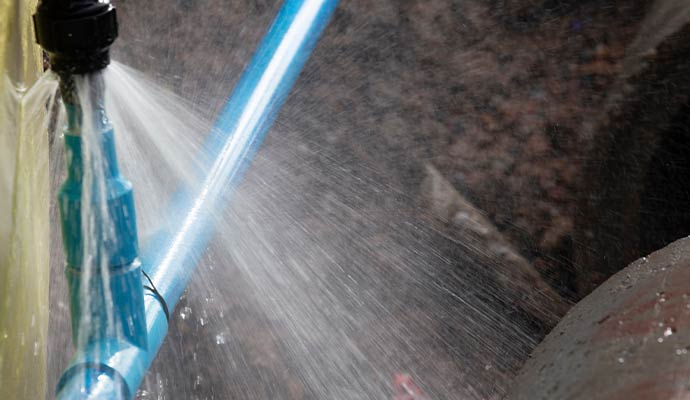 Emergency plumbing broken blue pipe