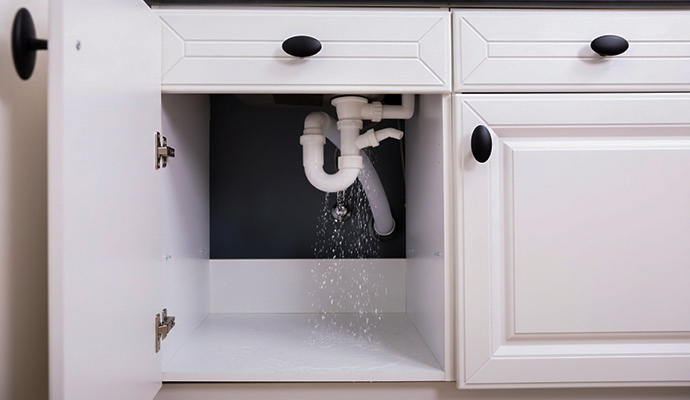 Water leaking from sink drain pipe